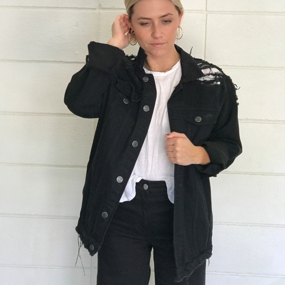 black denim jacket with rips